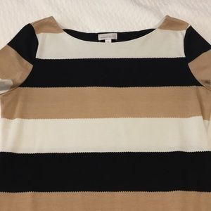 Black, tan, and white dress